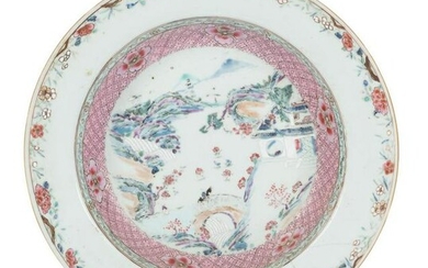 A large porcelain dish. Famille Rose. China. Qianlong