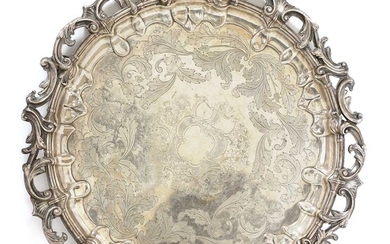 A large silver-plated circular tray