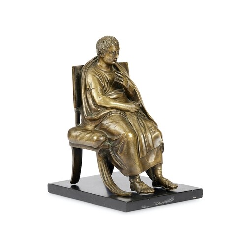 A late 19th century polished bronze figure of a seated Roman...