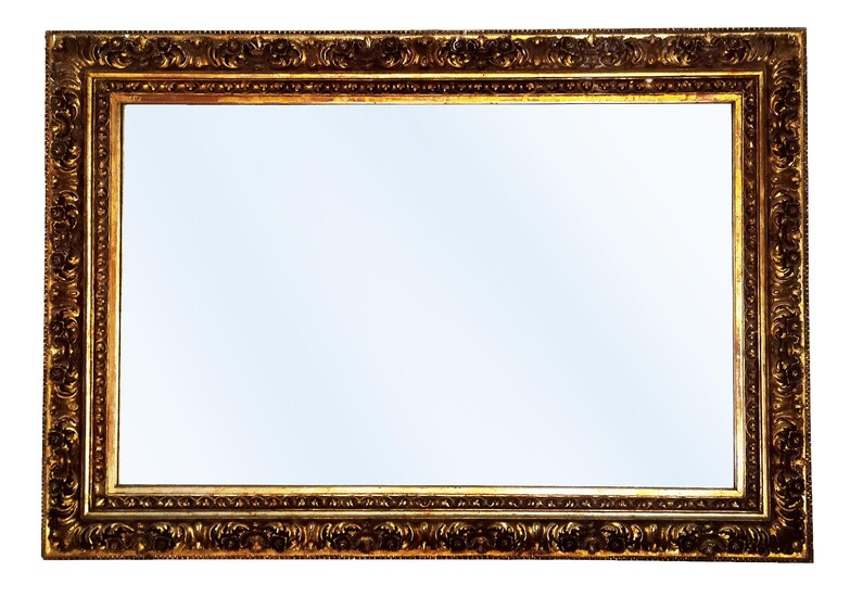 A modern gilt wood frame wall mirror