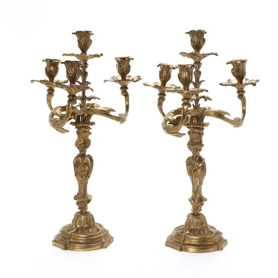 A pair of French 19th century Rococo style gilt bronze candelabra. H. 51.5 cm. (2)