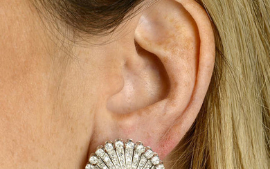 A pair of cushion-shape sapphire cabochon and vari-cut diamond cluster earrings.