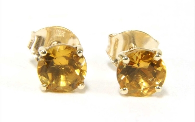 A pair of gold single stone citrine stud earrings