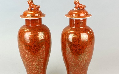 A pair of mid 20th Century Chinese orange glazed and gilt porcelain jars and lids, H. 31cm. One lid A/F.