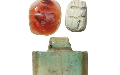 A pair of scarabs and an amulet