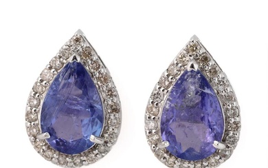 A pair of tanzanite ear pendants each set with a pear-shaped tanzanite...