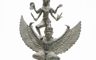 A patinated bronze figure, Wishnu and Garuda, Asia.