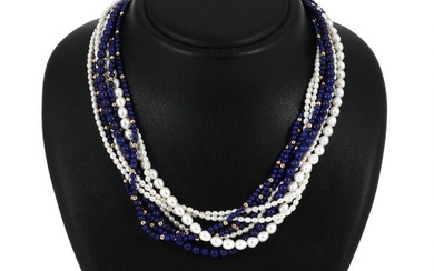 A pearl and lapis lazuli necklace set with numeorus pearls, lapis lazuli...