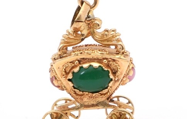 SOLD. A pendant in shape of a coach set with two cabochon chrysopras and two rose coloured glass pieces, mounted in 18k gold. App. 17.5 X 29 X 14 mm. Weight app. 7 g. – Bruun Rasmussen Auctioneers of Fine Art