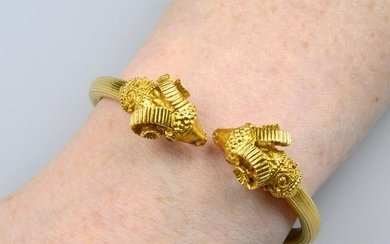 A ram's head hinged bangle, with ruby eyes, by Ilias