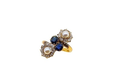 A sapphire, pearl and diamond cluster ring