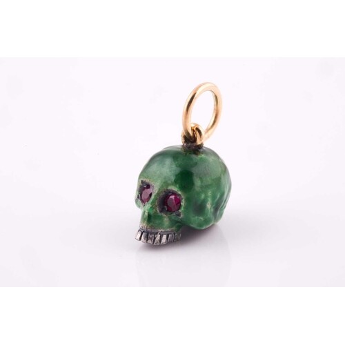 A silver and green enamel skull pendant, having round-cut ru...