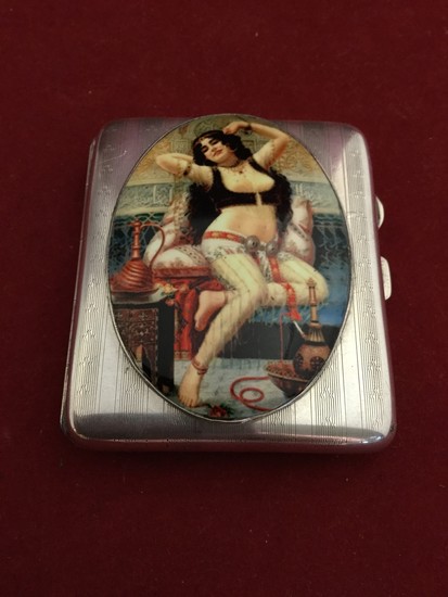 A silver cigarette case, with engine turned decoration, late...