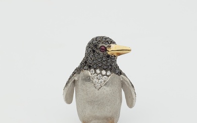A small German 18k bicolour gold, black and white diamond pinguin brooch.