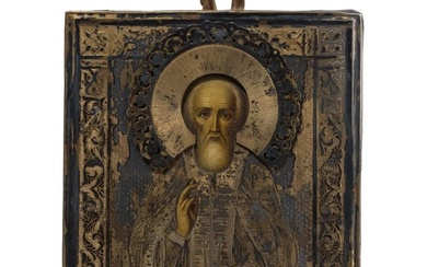A small Russian icon showing Saint Sergey of Radonezh with silver-gilt oklad, late 19th century