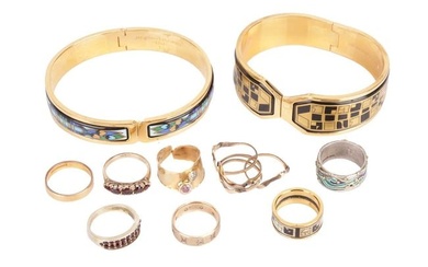 A small collection of jewellery items including a 22ct gold wedding band, a broken gem set ring in y