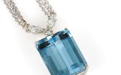 A three stand necklace with an aquamarine and diamond pendant set with...