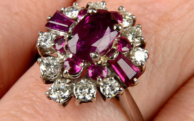 A vari-cut ruby and brilliant-cut diamond dress ring.