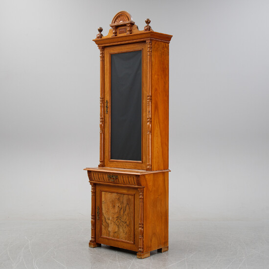 A walnut book cabinet, end of the 19th Century.
