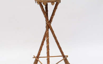 A wooden pedestal, rattan, 20th century.