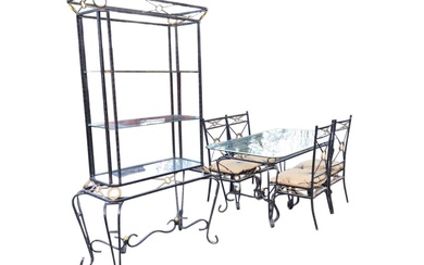 A wrought iron and glass dining room suite, with rounded...