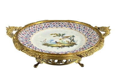AN 18TH CENTURY FRENCH VINCENNES PORCELAIN AND GILT BRONZE...