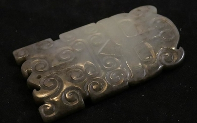 AN ANTIQUE JADE TABLET SHAPED WITH BEAST PATTERN