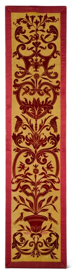 AN APPLIQUÉ PANEL OF RED VELVET ON A YELLOW SILK GROUND, ITALIAN OR SPANISH, IN 16TH CENTURY STYLE, CIRCA 1860