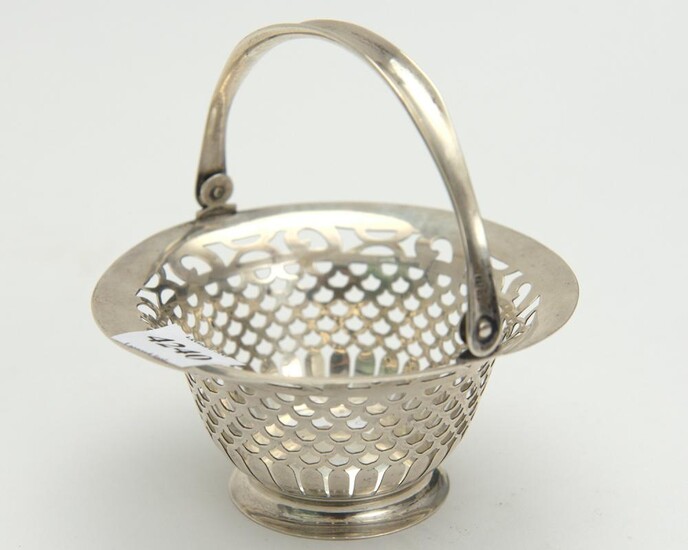 AN ENGLISH STERLING SILVER SWING HANDLED BASKET