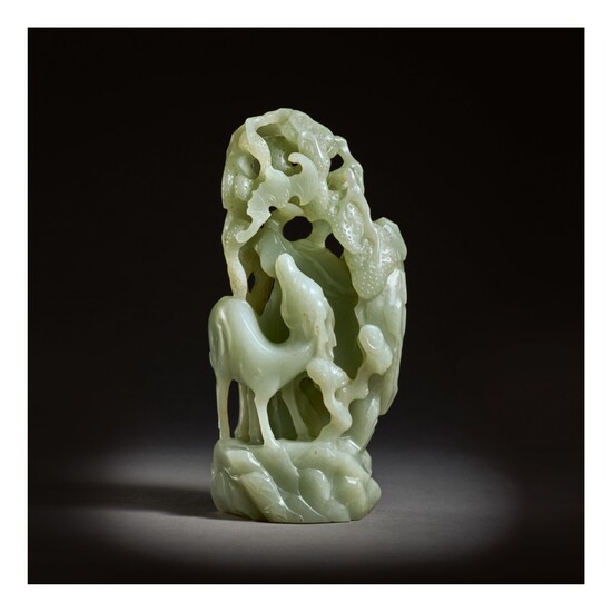 AN UNUSUAL PALE GREEN JADE 'DEER AND BAT' GROUP, QING DYNASTY, EARLY 18TH CENTURY