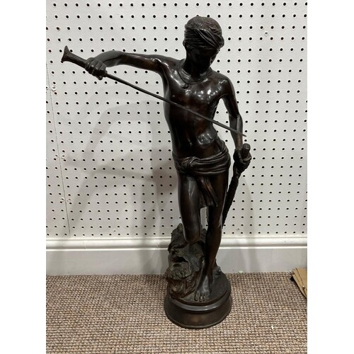 After Antonin Mercie, a bronze figure of David standing with...
