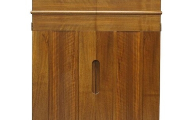 Alan Peters (1933-2009), a Devon walnut safe cabinet, 1994, two hinged panelled doors with inverted arch motif, 76cm high, 61cm wide, 71cm deep Provenance: Commissioned by TSB Group plc.; Lloyds TSB Group plc. for 60 Lombard St, bought April 2000.