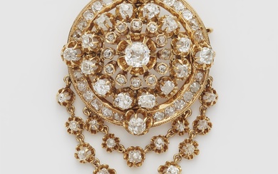 An 18k gold and diamond cluster brooch with festoons.