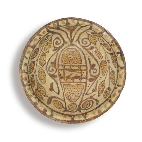 An Abbasid lustre pottery bowl, Mesopotamia, 9th Century