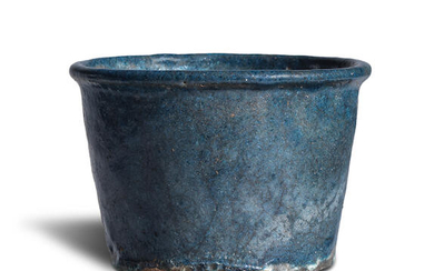 An Egyptian dark blue faience jar