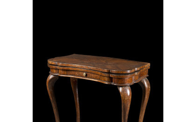 An Emilian 18th-century walnut veneered and inlaid gaming table (closed cm 81,5x76x41) (defects and restorations)