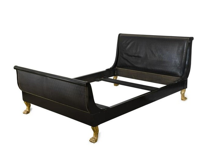 An Empire Style Ebonized and Gilt Wood Sleigh Bed