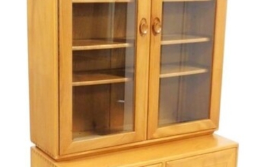 An Ercol elm kitchen dresser, with a pair of...