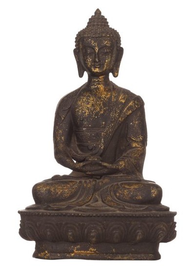 An Oriental gilt decorated bronze figure, depicting a...