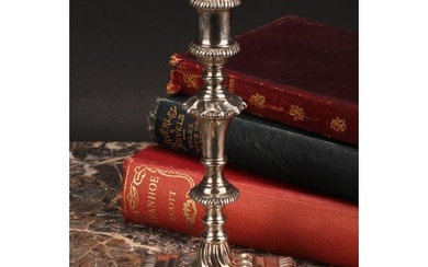An early George III cast silver taperstick, knopped pillar, ...