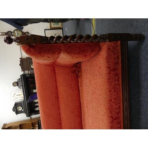An early Victorian mahogany and rosewood show-frame Sofa, wi...
