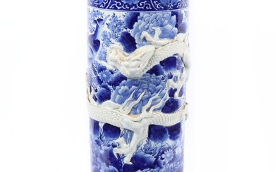 Antique Chinese early 20th Century blue and white porcelain umbrella stand with applied wrapping