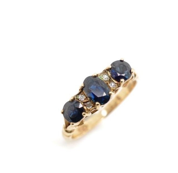 Blue and white spinel set 9ct rose gold ring marked 9ct GDNS...