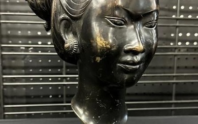 Bronze bust of Asian woman on wood base, marked as pictured. Measures 13" high with dark patina.