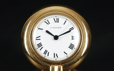 Cartier pendulette in metallo placcato in oro con quadrante circolare. Paris,...