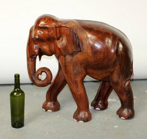 Carved teak wood elephant sculpture