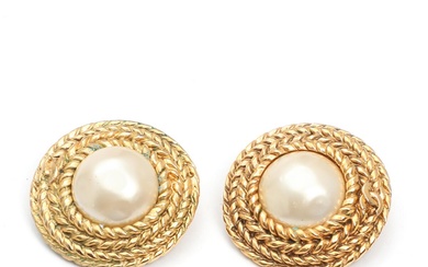 Chanel A pair of pearl earclips set with faux pearls, mounted in...