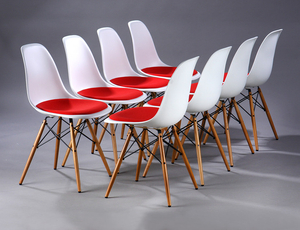 Charles Eames. Set of eight shell chairs with red hopsack, Model DSW (8)