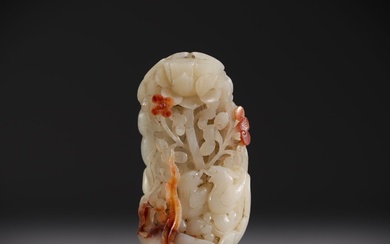 China - White and brown jade pendant with lotus flower...