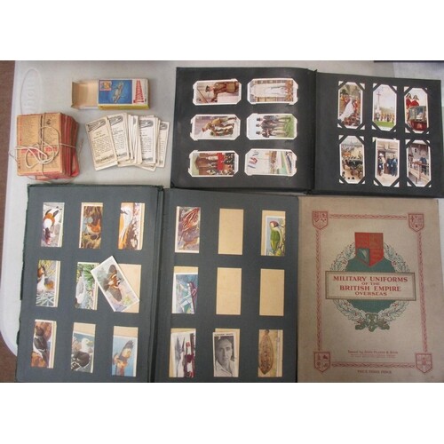 Collection of complete and part sets, in plastic sleeves, ol...